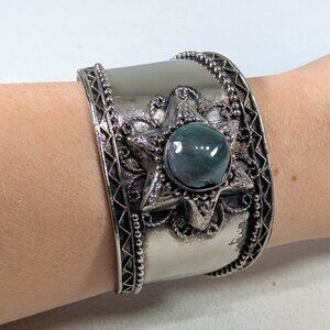 Chunky handmade cuff bracelet with green stone inset